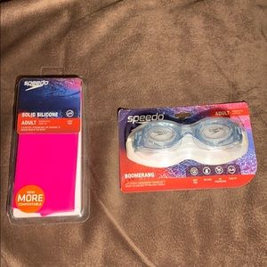 Speedo goggles and pink swim cap